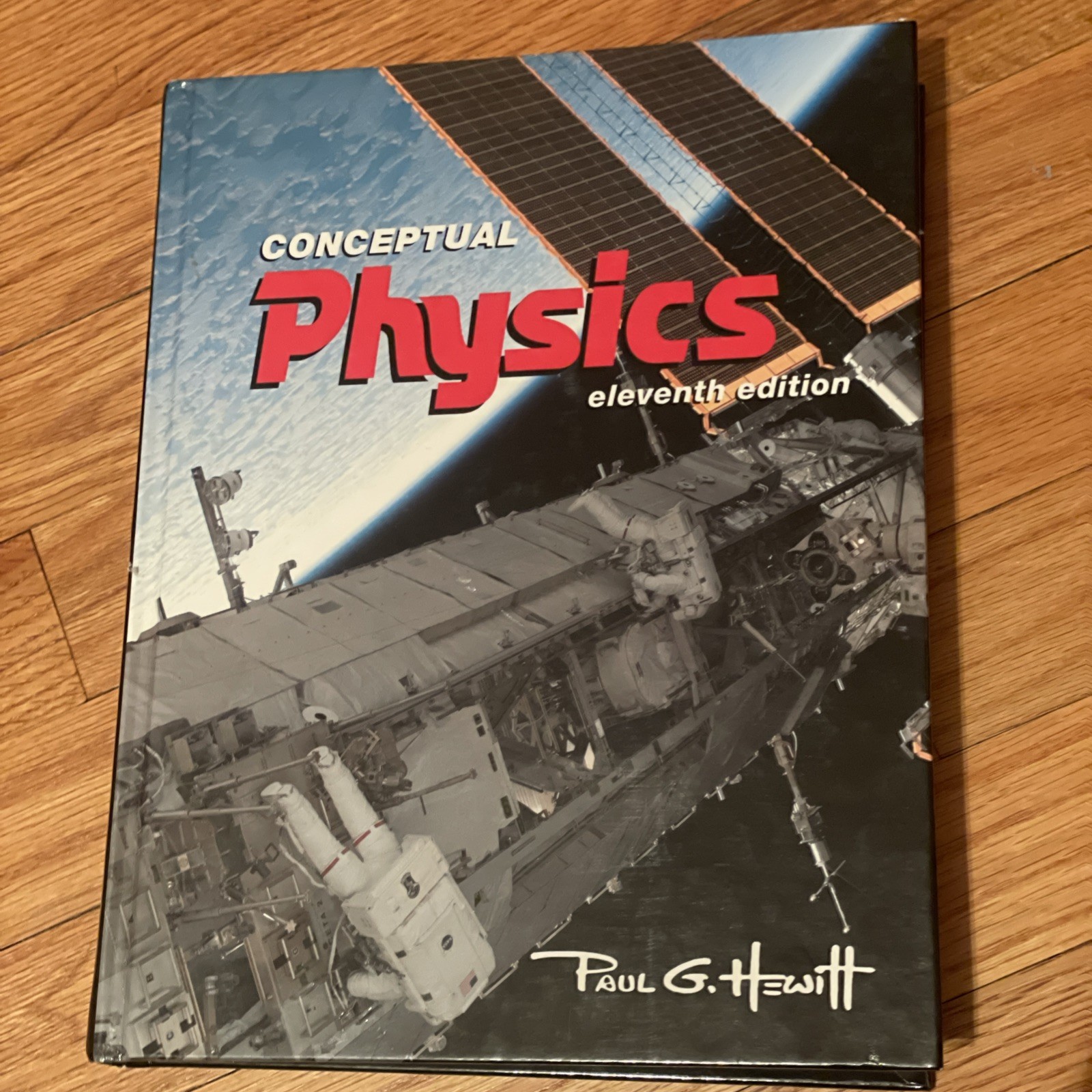 Conceptual Physics 11th Ed Book Paul G. Hewitt Hardcover – Very Nice!