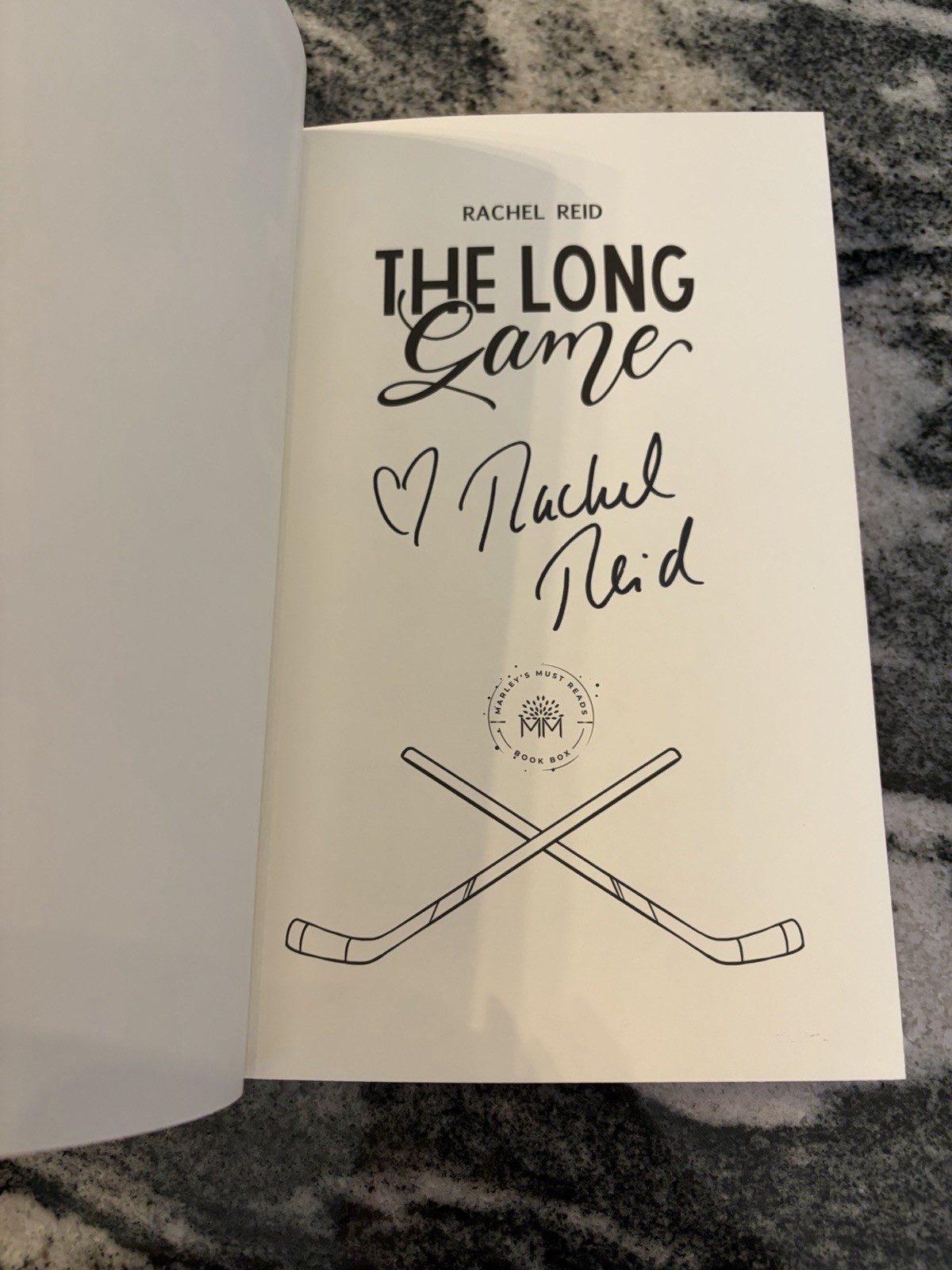 MMR Special Editions of Heated Rivalry and The Long Game by Rachel Reid