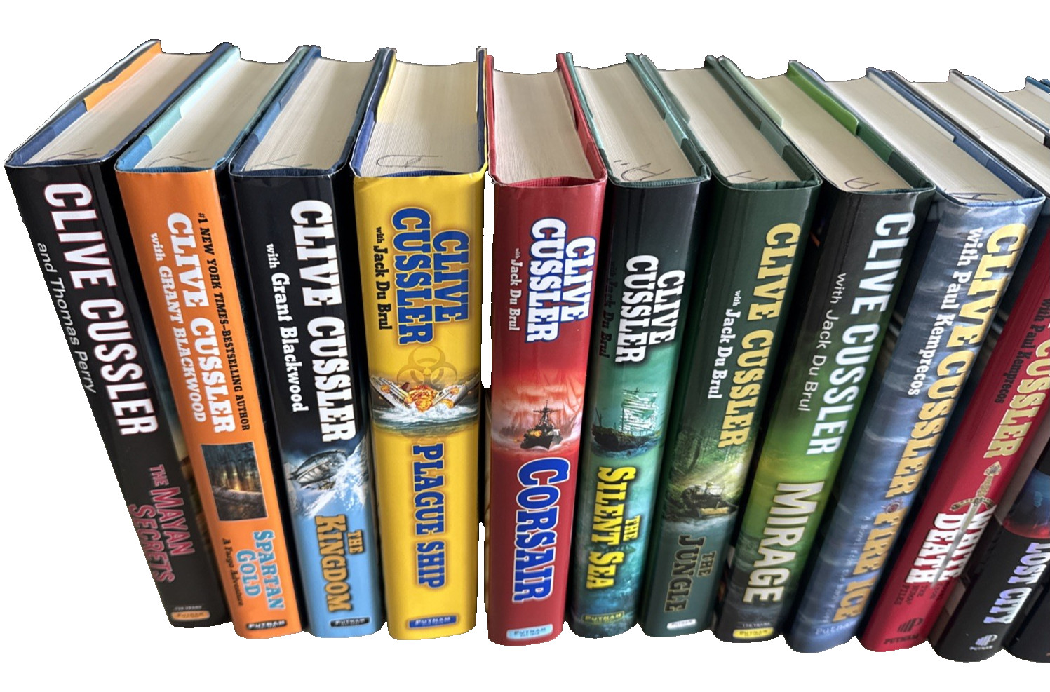 Clive Cussler Assorted Series – Lot 24 (19) Hard Cover and (5) Paperback